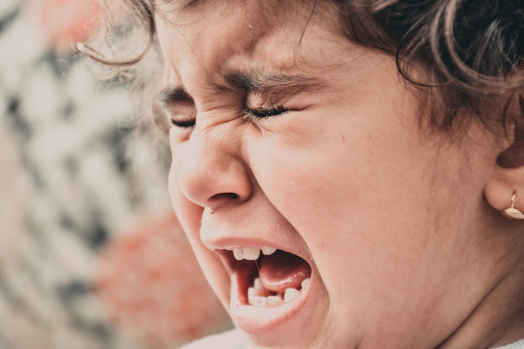 How to avoid Disney World meltdowns - tired child crying at theme park