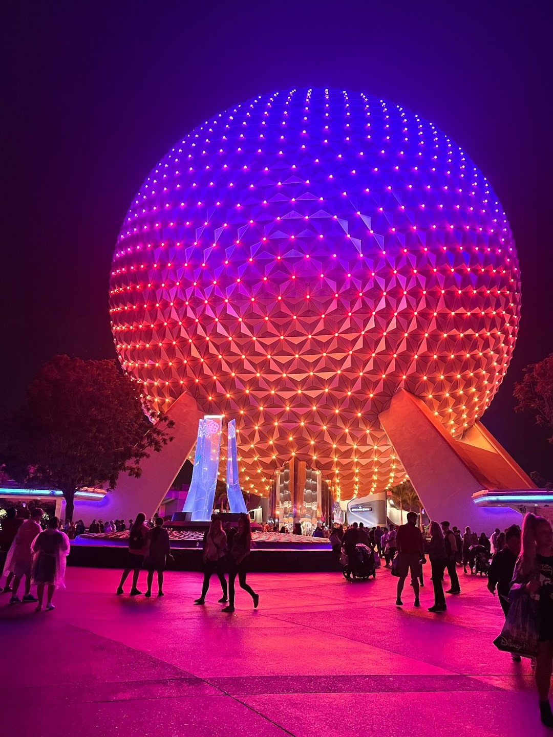 Extended Evening Hours at Disney World Spaceship Earth lit up at night